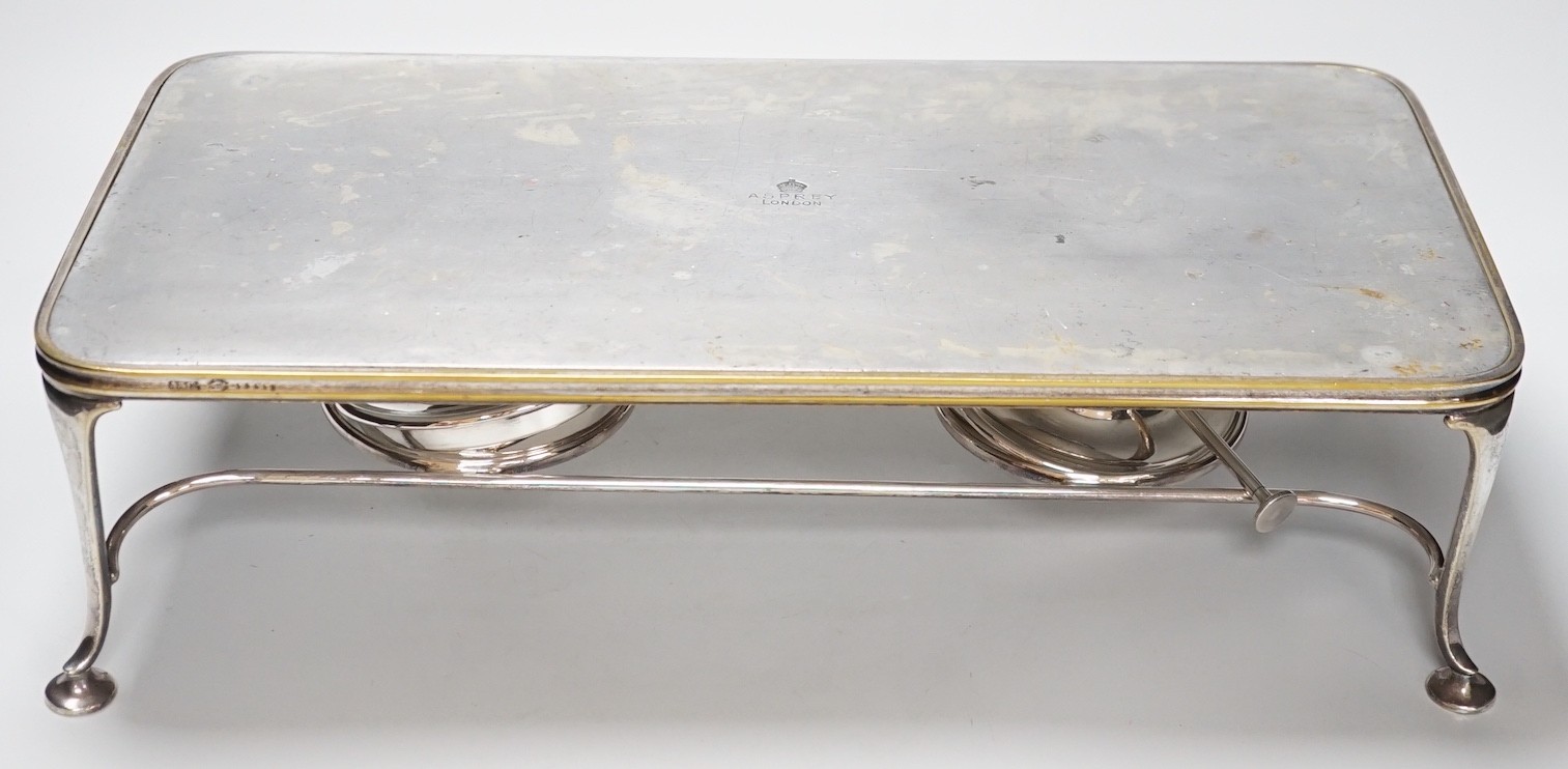 An Asprey spirit burner stand, serial number 19417, 47cm long